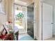 Welcoming entryway with a decorative door, a glass storm door and a glimpse of the outdoors at 321 Galway Ct., Longs, SC 29568
