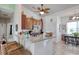 Kitchen with a breakfast bar, wooden cabinets, a stainless steel microwave and tile flooring at 321 Galway Ct., Longs, SC 29568