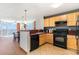 Functional kitchen featuring modern appliances, ample counter space, and stunning ocean views at 3500 N Ocean Blvd. # 902, North Myrtle Beach, SC 29582