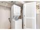 Convenient laundry room features a stacked washer and dryer with easy access at 3500 N Ocean Blvd. # 902, North Myrtle Beach, SC 29582