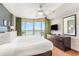 Comfortable main bedroom with a king-size bed, balcony access, and stunning ocean views at 3500 N Ocean Blvd. # 902, North Myrtle Beach, SC 29582