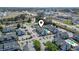 Aerial shot of condo complex with community pool and nearby highway at 3700 Golf Colony Lane # 13-H, Little River, SC 29566