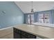 Open bedroom featuring a kitchen, a ceiling fan, and a balcony at 3700 Golf Colony Lane # 13-H, Little River, SC 29566