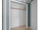 Walk-in closet featuring a wooden clothing rod and a clean, organized storage space at 3700 Golf Colony Lane # 13-H, Little River, SC 29566