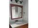 Bathroom features a wood cabinet, marble vanity, and modern fixtures at 380-K Myrtle Greens Dr. # 380-K, Conway, SC 29526