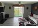 Cozy living room with a fireplace and a sliding door to a balcony with a view at 380-K Myrtle Greens Dr. # 380-K, Conway, SC 29526