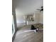 Bright living area with an open-concept design and neutral color scheme offering a versatile living space at 382 Waties Dr., Murrells Inlet, SC 29576