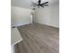 Spacious, open-concept living area with neutral walls and flooring that offers a versatile living space at 382 Waties Dr., Murrells Inlet, SC 29576