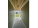 View of a covered entryway with a wooden ceiling and modern light fixture at 382 Waties Dr., Murrells Inlet, SC 29576
