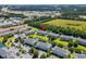 Extensive aerial view featuring the complex's layout amid landscaped areas and nearby amenities at 3927 Gladiola Ct. # 101, Myrtle Beach, SC 29588