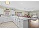 Spacious eat-in kitchen, with white cabinets, large island and views to the dining and living areas at 3927 Gladiola Ct. # 101, Myrtle Beach, SC 29588