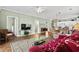 Bright and inviting living room with open floor plan, hardwood floors, and neutral paint at 3927 Gladiola Ct. # 101, Myrtle Beach, SC 29588