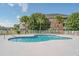 Outdoor pool with palm trees at 3927 Gladiola Ct. # 101, Myrtle Beach, SC 29588