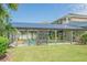 Enclosed pool area featuring ample seating and clear enclosure walls for year-round enjoyment at 3927 Gladiola Ct. # 101, Myrtle Beach, SC 29588