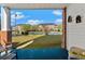 View from the porch of community green space, pond, and condo buildings at 3927 Gladiola Ct. # 101, Myrtle Beach, SC 29588