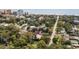 Aerial view showcasing a property's location near the beach, surrounded by mature trees and neighborhood streets at 404 66Th Ave. N, Myrtle Beach, SC 29572