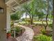 Charming walkway through a landscaped front yard of a home at 404 66Th Ave. N, Myrtle Beach, SC 29572