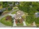 An aerial view of a well-maintained property, showcasing its extensive driveway and landscaping at 404 Club Dr., Myrtle Beach, SC 29572