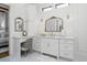 A stylish bathroom vanity with decorative mirrors, a makeup vanity, and bright lighting at 404 Club Dr., Myrtle Beach, SC 29572