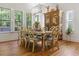 Elegant dining room with a chandelier, decorative furniture, and shuttered windows at 404 Club Dr., Myrtle Beach, SC 29572