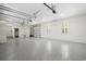 Spacious garage with epoxy flooring, ample lighting, and convenient access to the interior at 404 Club Dr., Myrtle Beach, SC 29572