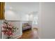 Bright hallway with hardwood floors, panel molding and a window seat beneath the bright window at 404 Club Dr., Myrtle Beach, SC 29572