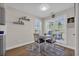 Bright dining area with a cozy table setting and abundant natural light at 4208 Edgefield Rd., Little River, SC 29566