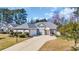 Beautiful one-story home with a grey roof, attached garage, and well-kept lawn at 4208 Edgefield Rd., Little River, SC 29566