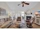Inviting living room with a cozy fireplace and plenty of natural light at 4208 Edgefield Rd., Little River, SC 29566