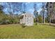 Storage shed in back yard with double doors, offering extra storage space at 4208 Edgefield Rd., Little River, SC 29566