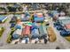 Aerial view of the colorful community with multiple homes and a pool at 4350 Grande Harbour Blvd., Little River, SC 29566