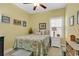 Bright bedroom with yellow walls, decorative accents, and a comfortable bed at 4350 Grande Harbour Blvd., Little River, SC 29566