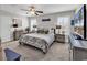 Comfortable bedroom featuring soft lighting, patterned bedding, and coastal accents at 4350 Grande Harbour Blvd., Little River, SC 29566
