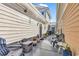 Inviting outdoor patio featuring comfortable seating, potted plants, and a tranquil atmosphere for relaxing at 4350 Grande Harbour Blvd., Little River, SC 29566