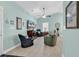 Spacious living room with tile floors, comfortable seating, and a television for relaxation and entertainment at 4350 Grande Harbour Blvd., Little River, SC 29566
