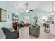 Bright living room with tile floors, vaulted ceilings, comfortable seating, and an open-concept design at 4350 Grande Harbour Blvd., Little River, SC 29566