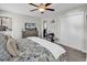 Cozy main bedroom with soft carpeting, a ceiling fan, a TV, and double closets at 4350 Grande Harbour Blvd., Little River, SC 29566