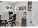 Office room with modern desk, chair, filing cabinet, and unique oval window at 4350 Grande Harbour Blvd., Little River, SC 29566