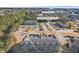 Aerial view of a condo complex with a pool, private boat slips, and dry boat storage at 4503 W Harbour Ct. # S-12, Little River, SC 29566