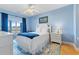 Bright bedroom with hardwood floors and access to a balcony at 4503 W Harbour Ct. # S-12, Little River, SC 29566