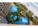 Aerial view of resort pools, lush landscaping, and direct beach access for the ultimate vacation experience at 4800 S Ocean Blvd. # 1418, North Myrtle Beach, SC 29582