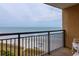 Balcony with stunning ocean views and comfortable seating, ideal for enjoying coastal scenery at 4800 S Ocean Blvd. # 1418, North Myrtle Beach, SC 29582