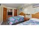 Inviting bedroom with two beds, warm lighting, and beach-inspired accents, offering a cozy retreat at 4800 S Ocean Blvd. # 1418, North Myrtle Beach, SC 29582