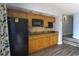 Well-equipped kitchen with wood cabinetry, modern appliances, and granite countertops, offering functionality and style at 4800 S Ocean Blvd. # 1418, North Myrtle Beach, SC 29582