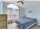 Charming bedroom with vaulted ceilings and a large window with a street view for lots of natural light at 4814 Innisbrook Ct. # 412, Myrtle Beach, SC 29579