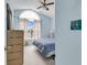 Light blue bedroom features a vaulted ceiling, neutral carpet, and a large window with bright light at 4814 Innisbrook Ct. # 412, Myrtle Beach, SC 29579