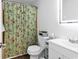 Bathroom with modern fixtures, and floral shower curtain at 500 Fairway Village Dr. # 7-D, Myrtle Beach, SC 29588