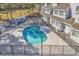 Aerial view of a sparkling community pool with a cabana for residents to enjoy the hot summer months at 500 Fairway Village Dr. # 7-D, Myrtle Beach, SC 29588