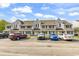 Exterior view of the residential building featuring assigned parking and a well-maintained community at 500 Fairway Village Dr. # 7-D, Myrtle Beach, SC 29588
