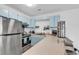 Cozy kitchen featuring stainless steel appliances, and ample counter space at 500 Fairway Village Dr. # 7-D, Myrtle Beach, SC 29588